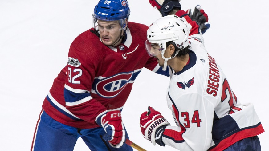 Washington Capitals&#039; Jonas Siegenthaler is stopped by Montreal Canadiens&#039; Jonathan Drouin during the first period of a preseason NHL hockey game, Wednesday, Sept. 20, 2017 in Montreal. (Paul ...