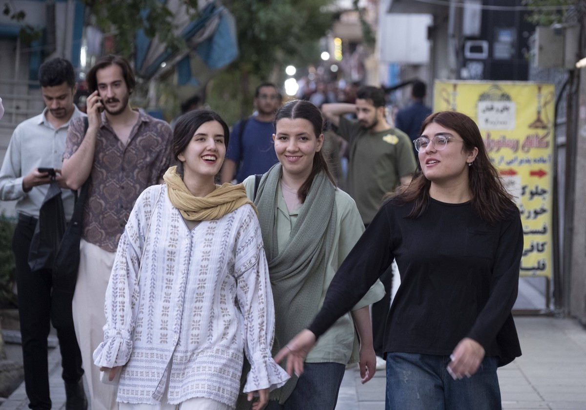 Daily Life In Iran On Eve Of Iran U.S. Agreement Young Iranian women walk along a sidewalk in downtown Tehran, Iran, on June 15, 2026. The United States and the Islamic Republic are set to sign a memo ...