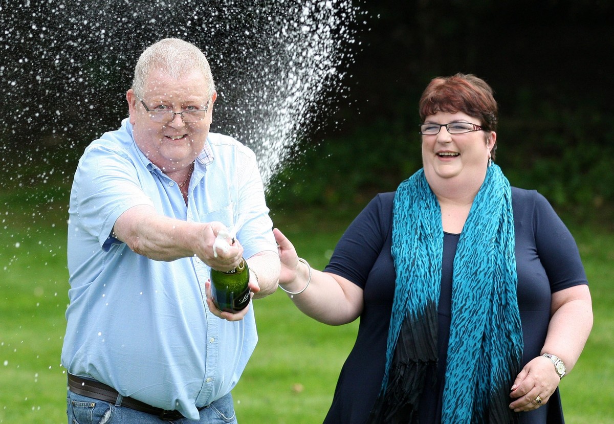 epa02824926 Colin (R) and Chris Weir, from Largs in Ayrshire, celebrate their win at the Macdonald Inchyra Hotel &amp; Spa in Falkirk, Scotland, Britain, 15 July 2011, after they scooped 161 million G ...