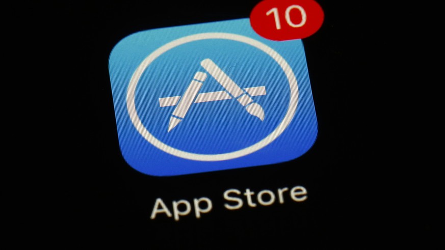 FILE - Apple&#039;s App Store icon is displayed on an iPad in Baltimore, March 19, 2018. Apple has unveiled a sweeping plan to tear down some of the competitive barriers that it has built around its l ...