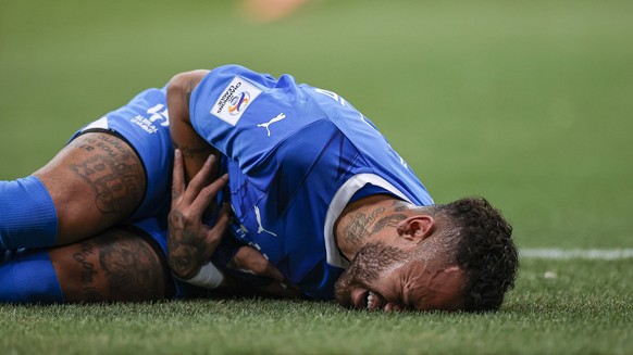 Sport Bilder des Tages AFC Champions League 2023-24 MD1 Neymar JR of Al-Hilal SFC KSA lies on the field after being tackled by a player of PFC Navbahor UZB during their Match Day 1 of the AFC Champion ...