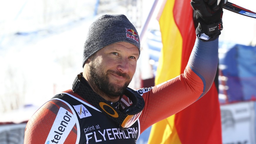 FILE - In this Saturday, March 10, 2018 file photo, Norway's Aksel Lund Svindal celebrates after taking third place in an alpine ski, men's World Cup downhill, in Kvitfjell, Norway. Aksel Lu ...