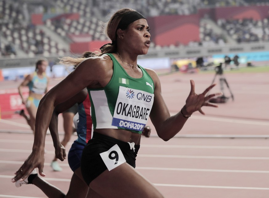 Blessing Okagbare, of Nigeria races in a women&#039;s 200 meter heat at the World Athletics Championships in Doha, Qatar, Sept. 30, 2019. U.S. prosecutors charged a Texas man on Wednesday, Jan. 12, 20 ...