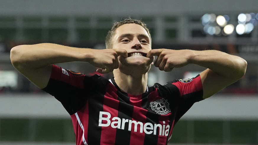 Leverkusen&#039;s Florian Wirtz celebrates with a smile after he scored his side&#039;s second goal during the Europa League Group G soccer match between Bayer Leverkusen and Ferencvaros Budapest in L ...