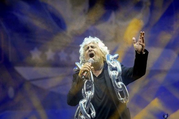 Five Stars Movement founder Beppe Grillo delivers his speech from the stage during a movement&#039;s meeting in Rimini, Italy, Saturday, Sept. 23, 2017. Italy&#039;s anti-establishment 5-Star Movement ...