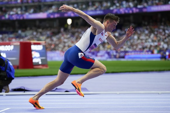 Karsten Warholm, of Norway, competes in the men's 400-meter hurdles heat at the 2024 Summer Olympics, Monday, Aug. 5, 2024, in Saint-Denis, France. (AP Photo/Petr David Josek)