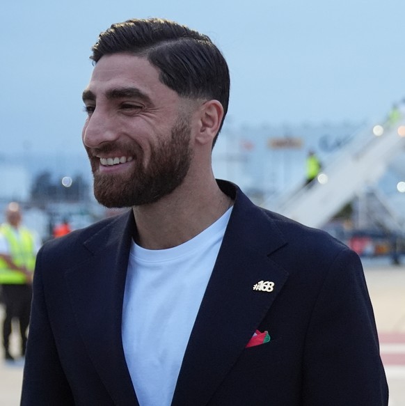 Iran's Alireza Jahanbakhsh smiles as he arrives with his teammates for the World Cup soccer tournament in Tijuana, Mexico, Sunday, June 7, 2026. (AP Photo/Gregory Bull)
Alireza Jahanbakhsh