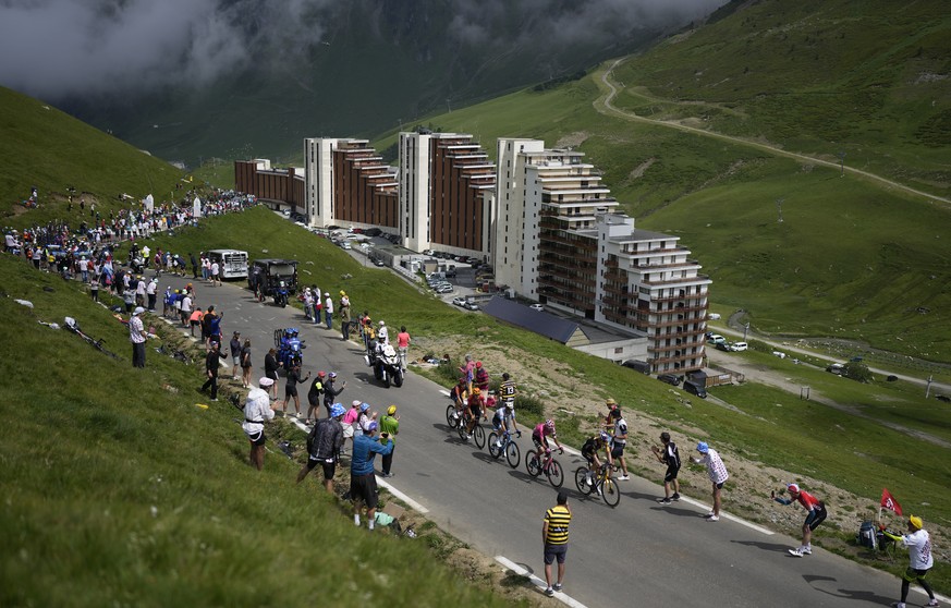 Belgium's Wout Van Aert leads Britain's James Shaw, Portugal's Ruben Guerreiro, Norway's Tobias Halland Johannessen and Poland's Michal Kwiatkowski during the sixth stage of t ...