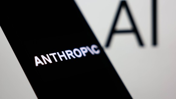 Anthropic AI Photo Illustrations Anthropic logo displayed on a phone screen and AI sign displayed on a screen are seen in this illustration photo taken in Krakow, Poland on December 26, 2025. Krakow P ...