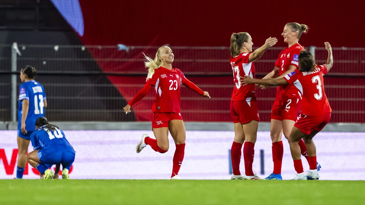 Switzerland's Julia Stierli, 2nd right, celebrates her goal with her teammates Switzerland's Alisha Lehmann, left, Switzerland's Lia Waltiand Switzerland's Leila Wandeler, right, a ...