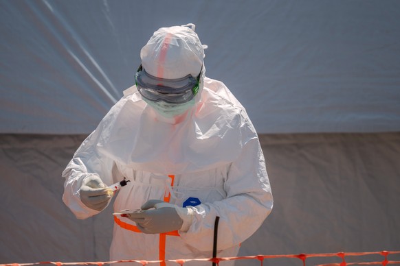 FILE - A health worker prepares a patient's blood sample for testing at Bunia General Hospital in Bunia, Congo, Thursday, June 11, 2026. (AP Photo/Moses Sawasawa, File)
Congo-Ebola-U.S. Citizen