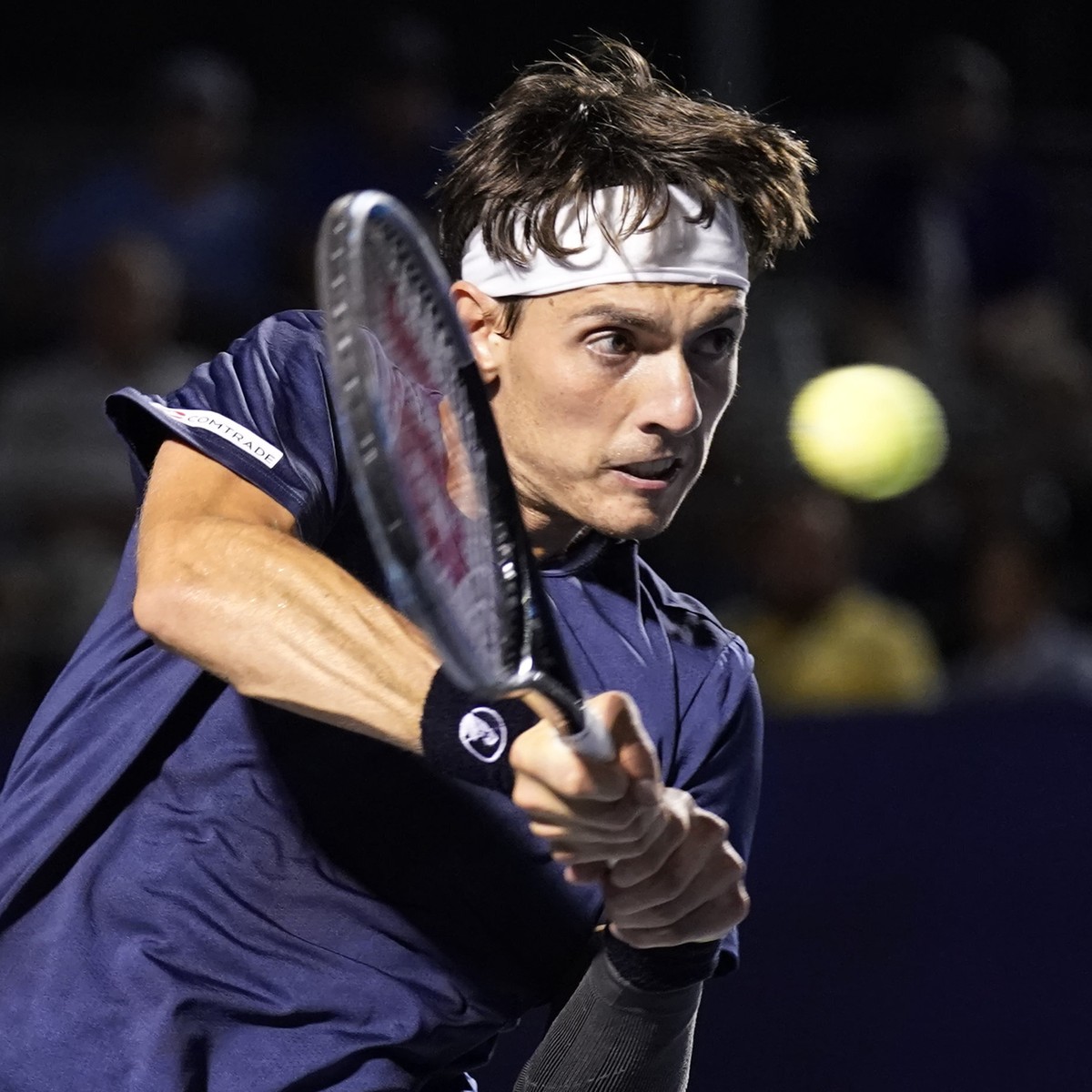 Marc-Andrea Huesler, of Switzerland, returns a shot against Laslo Djere, of Serbia, during their semifinal match in the Winston-Salem Open tennis tournament in Winston-Salem, N.C., Friday, Aug. 26, 20 ...