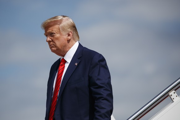 FILE - In this Thursday, Sept. 26, 2019 file photo, President Donald Trump steps off Air Force One after arriving at Andrews Air Force Base, Md. The BBC is facing a backlash after finding one of its p ...