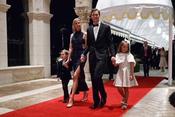 Jared Kushner and Ivanka Trump arrive with daughter Arabella Kushner and son Joseph Kushner for a New Year&#039;s Eve gala at Mar-a-Lago, Sunday, Dec. 31, 2017, in Palm Beach, Fla. (AP Photo/Evan Vucc ...