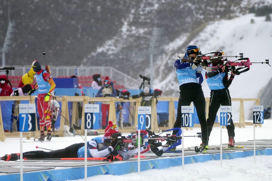 Biathletes practice target shooting at the 2022 Winter Olympics, Friday, Feb. 4, 2022, in Zhangjiakou, China. (AP Photo/Frank Augstein)