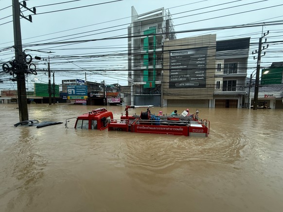 A fire truck is submerged in floodwaters in Songkhla province, southern Thailand, Monday, Nov. 24, 2025. (AP Photo)
Extreme Weather Southeast Asia Flooding