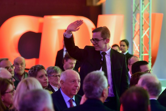 epa08249975 Member of Parliament at the German Parliament Bundestag of the Christian Democratic Union (CDU) Philipp Amthor waves as he attends the 25th Political Ash Wednesday gathering of the CDU in  ...