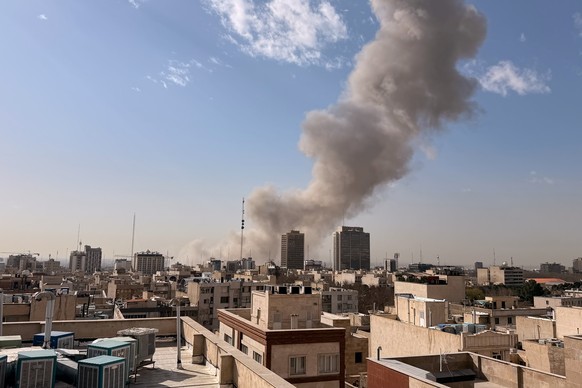 KEYPIX - Smoke rises on the skyline after an explosion in Tehran, Iran, Saturday, Feb. 28, 2026.(AP Photo)