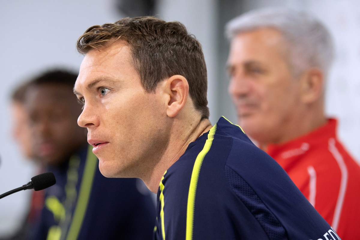 epa07996066 Switzerland's Stephan Lichtsteiner (front) speaks during a press conference in St. Gallen, Switzerland, 14 November 2019. Switzerland will face Georgia in their UEFA EURO 2020 qualify ...