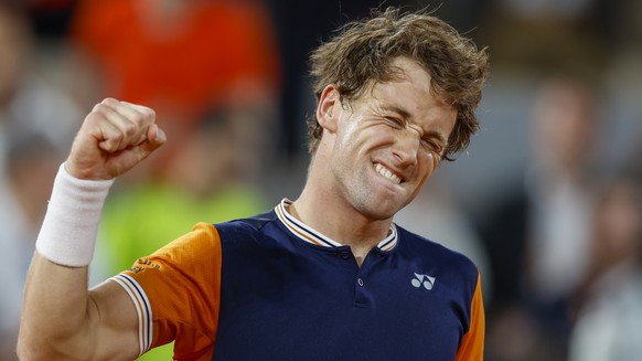 Norway&#039;s Casper Ruud celebrates winning his quarterfinal match of the French Open tennis tournament against Denmark&#039;s Holger Rune in four sets, 6-1, 6-2, 3-6, 6-3, at the Roland Garros stadi ...
