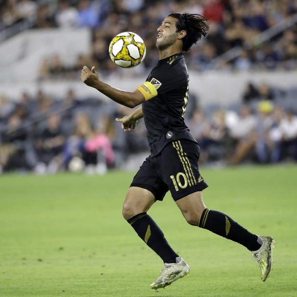 Los Angeles FC&#039;s Carlos Vela traps the ball with his chest during the first half of an MLS soccer match against Toronto FC Saturday, Sept. 21, 2019, in Los Angeles. (AP Photo/Marcio Jose Sanchez) ...