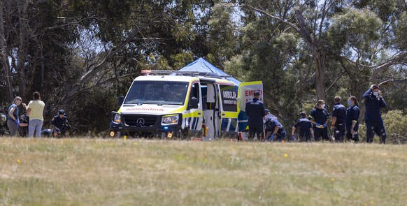 epa09644348 Emergency services personnel on scene at Hillcrest Primary School in Devonport, Tasmania, Australia, 16 December 2021. Several children have suffered serious injuries in northwest Tasmania ...