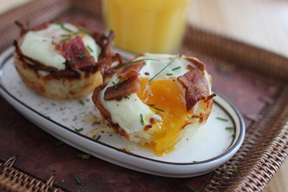 This March 2, 2015 photo shows baked egg and hash brown cups in Concord, NH. (AP Photo/Matthew Mead)