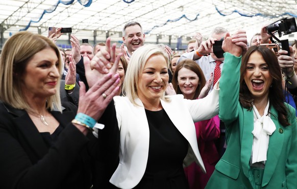Sinn Fein&#039;s Vice President Michelle O&#039;Neill, centre, celebrates with party colleagues after being elected in Mid Ulster at the Medow Bank election count centre in Magherafelt , Northern Irel ...