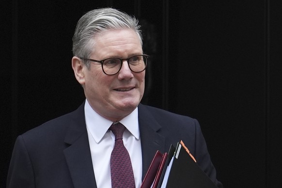 British Prime Minister Sir Keir Starmer departs 10 Downing Street, London, to attend Prime Minister&#039;s Questions at the Houses of Parliament, Wednesday Feb. 12, 2025. (Jordan Pettitt/PA via AP)