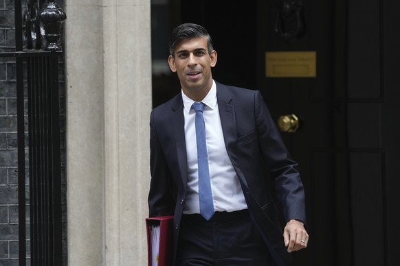 Britain&#039;s Prime Minister Rishi Sunak leaves 10 Downing Street to attend his weekly Prime Minister&#039;s Questions at the House of Commons, in London, Wednesday, Sept. 13, 2023. (AP Photo/Kin Che ...