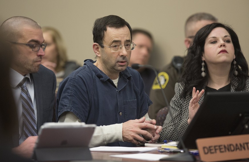 epa06444084 Dr. Larry Nassar appears during court proceedings in the sentencing phase in Lansing, Michigan, USA, 16 January 2018. Nassar was a doctor at Michigan State University and for the US Gymnas ...