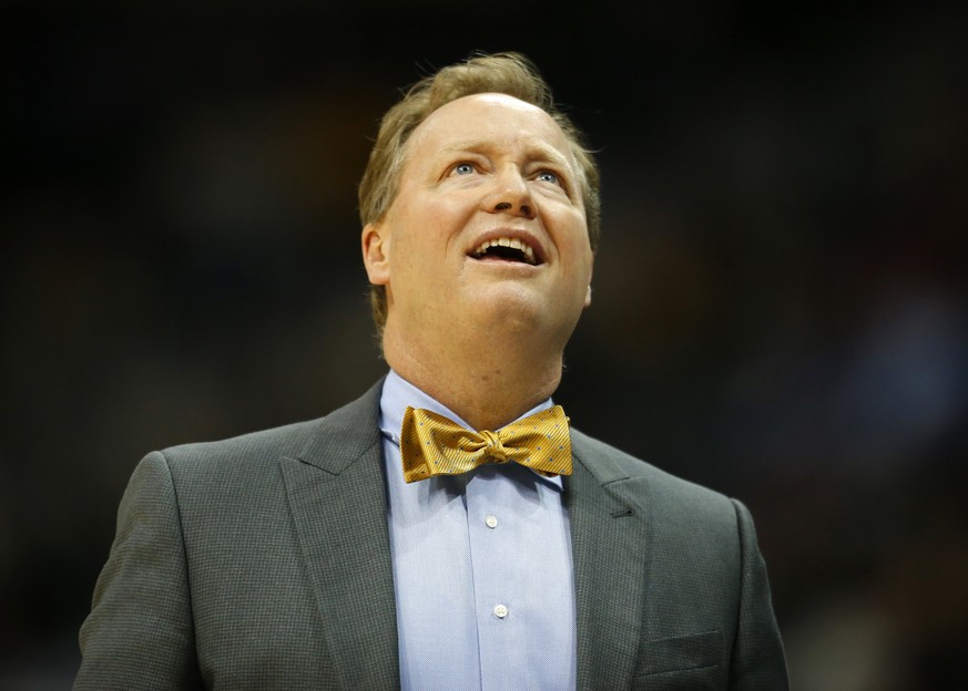 Atlanta Hawks head coach Mike Budenholzer watches a replay in the first half of an NBA basketball game against the New York Knicks on Sunday, Jan. 29, 2017, in Atlanta. The Hawks won the game in the f ...