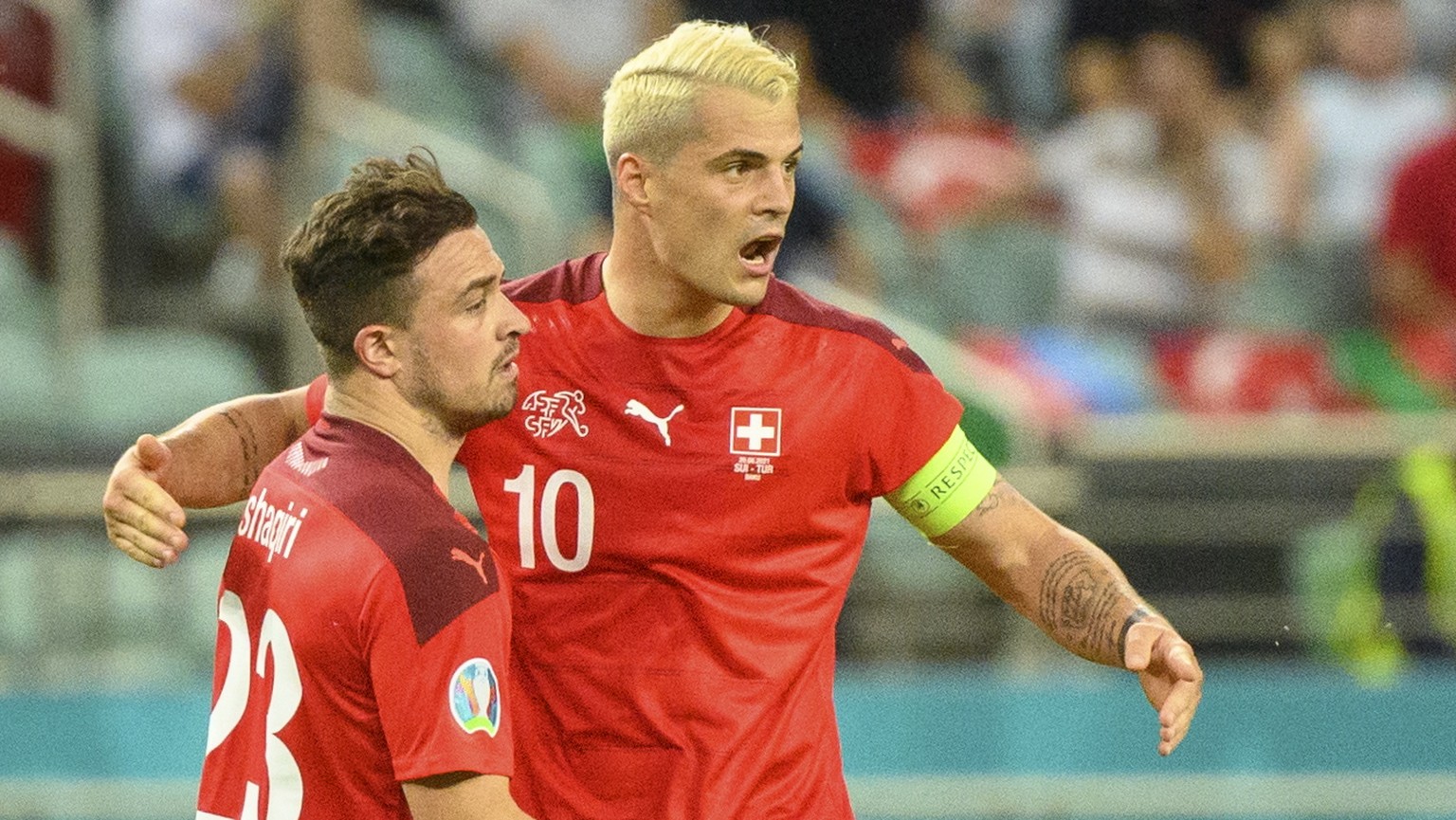 epa09288931 Switzerland&#039;s midfielder Xherdan Shaqiri (L) celebrates the second goal with Switzerland&#039;s midfielder Granit Xhaka during the UEFA EURO 2020 group A preliminary round soccer matc ...