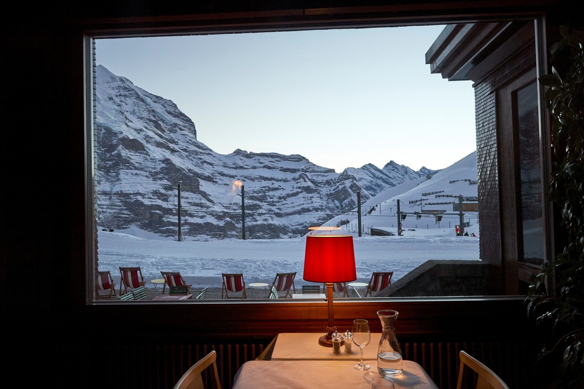 A table is set at the Bellevue hotel at the Kleine Scheidegg in Wengen, Switzerland, January 14, 2022. REUTERS/Denis Balibouse