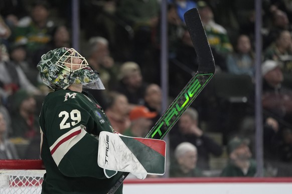 Minnesota Wild goaltender Marc-Andre Fleury (29) looks at the video board after a goal scored by Vegas Golden Knights center Brett Howden (21) during the second period of an NHL hockey game, Tuesday,  ...