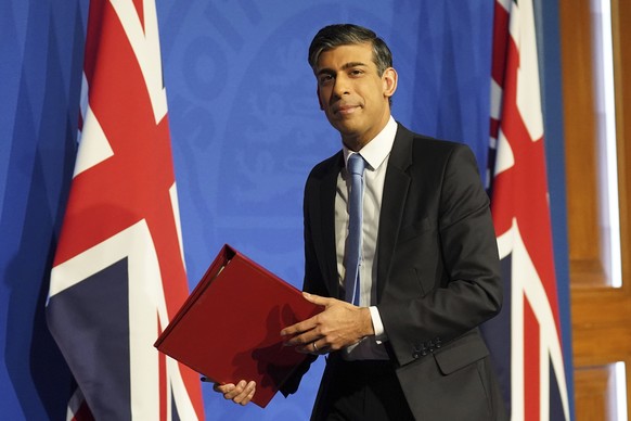 Britain&#039;s Prime Minister Rishi Sunak leaves following a press conference in Downing Street in London, Thursday Jan. 18, 2024. Sunak quelled a Conservative Party rebellion and got his stalled plan ...