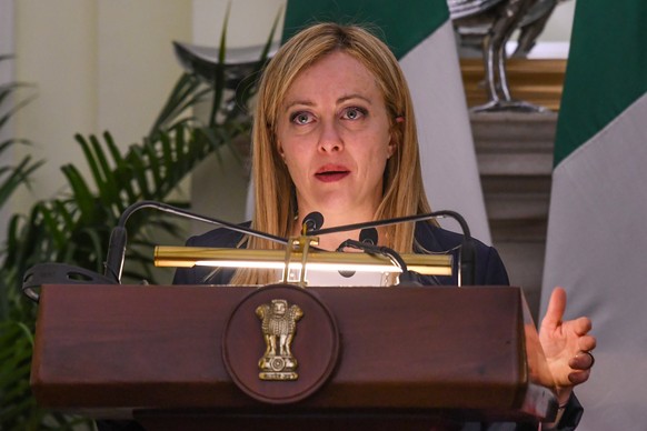 epa10498419 Italian Prime Minister Giorgia Meloni addresses a joint press conference with her Indian counterpart (not pictured) following their meeting and an exchange of agreements in New Delhi, Indi ...