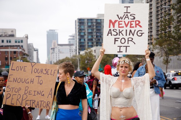 epa07074973 Marchers show their opposition to sexual violence as the US Senate votes on the Supreme Court nomination of Brett Kavanaugh during the &#039;Amber Rose SlutWalk&#039; in Los Angeles, Calif ...