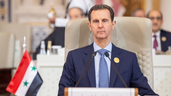 epa10970147 A handout photo made available by Iran&#039;s Presidential Office shows Syrian President Bashar Al-Assad attending the Organization of Islamic Cooperation (OIC) leaders summit on Palestine ...