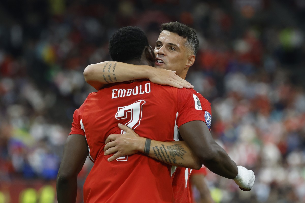 KEYPIX - Switzerland's Breel Embolo, left, celebrates with Switzerland's Granit Xhaka after the first goal for Switzerland during the World Cup round of 32 soccer match between Switzerland a ...
