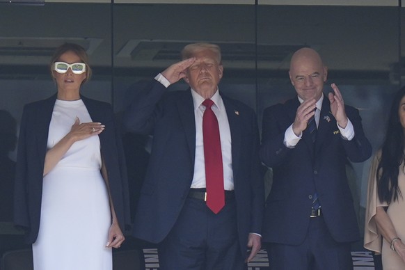 KEYPIX - FIFA President Gianni Infantino, right, President Donald Trump and first lady Melania Trump listen during the playing of the national anthem before the Club World Cup final soccer match betwe ...