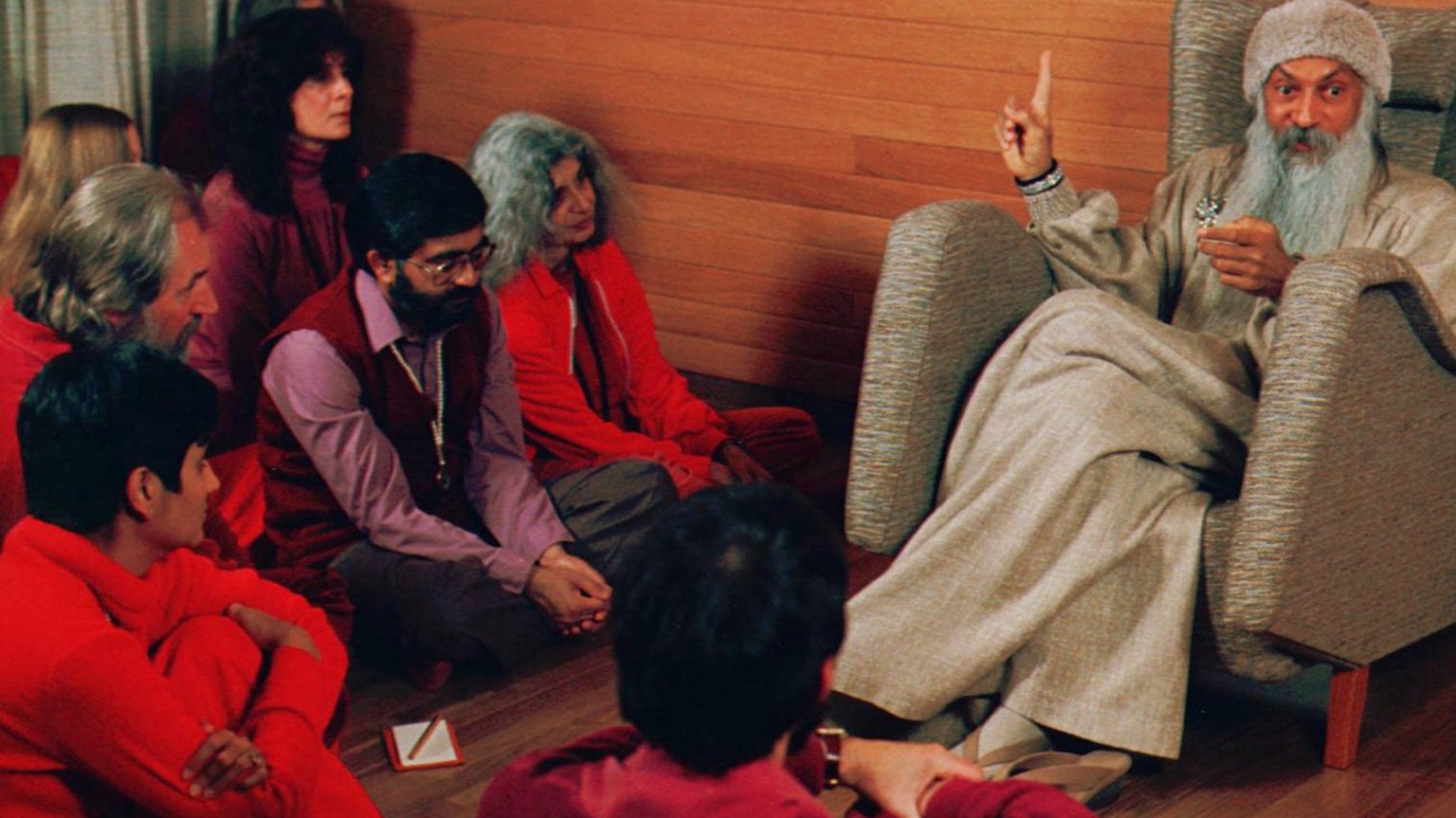 Bhagwan Shree Rajneesh, right, speaks with his disciples in this undated photo in Rajneeshpuram, Ore. Patrons of 10 restaurants in The Dalles, Ore., became ill in Sept. 1984, after being poisoned by m ...