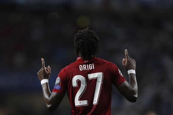 Liverpool&#039;s Divock Origi celebrates after scoring his side&#039;s second goal during the Champions League final soccer match between Tottenham Hotspur and Liverpool at the Wanda Metropolitano Sta ...