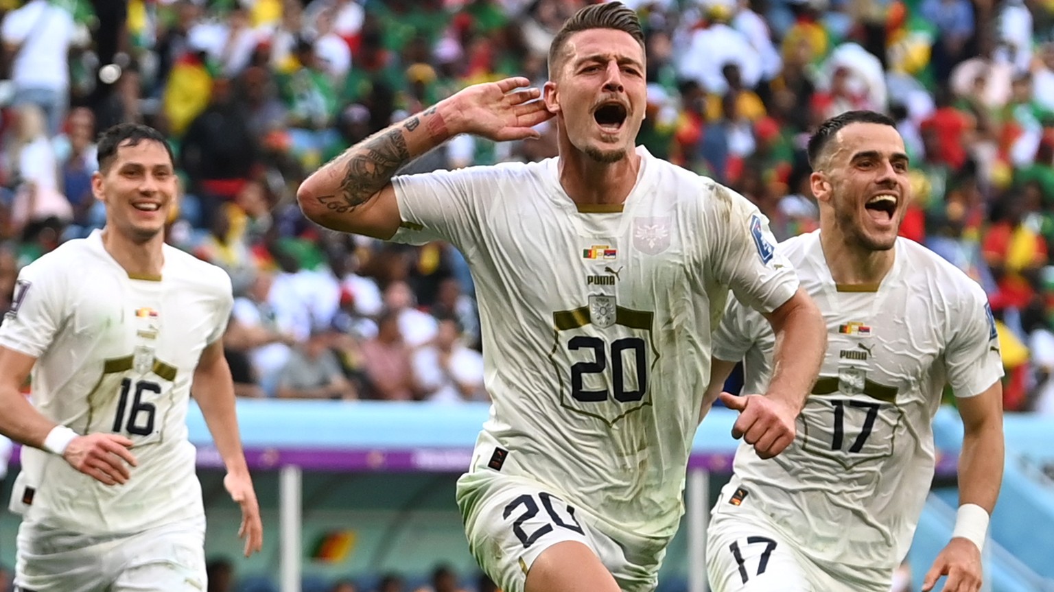 epa10333837 Sergej Milinkovic-Savic (C) of Serbia celebrates scoring the 2-1 lead during the FIFA World Cup 2022 group G soccer match between Cameroon and Serbia at Al Janoub Stadium in Al Wakrah, Qat ...