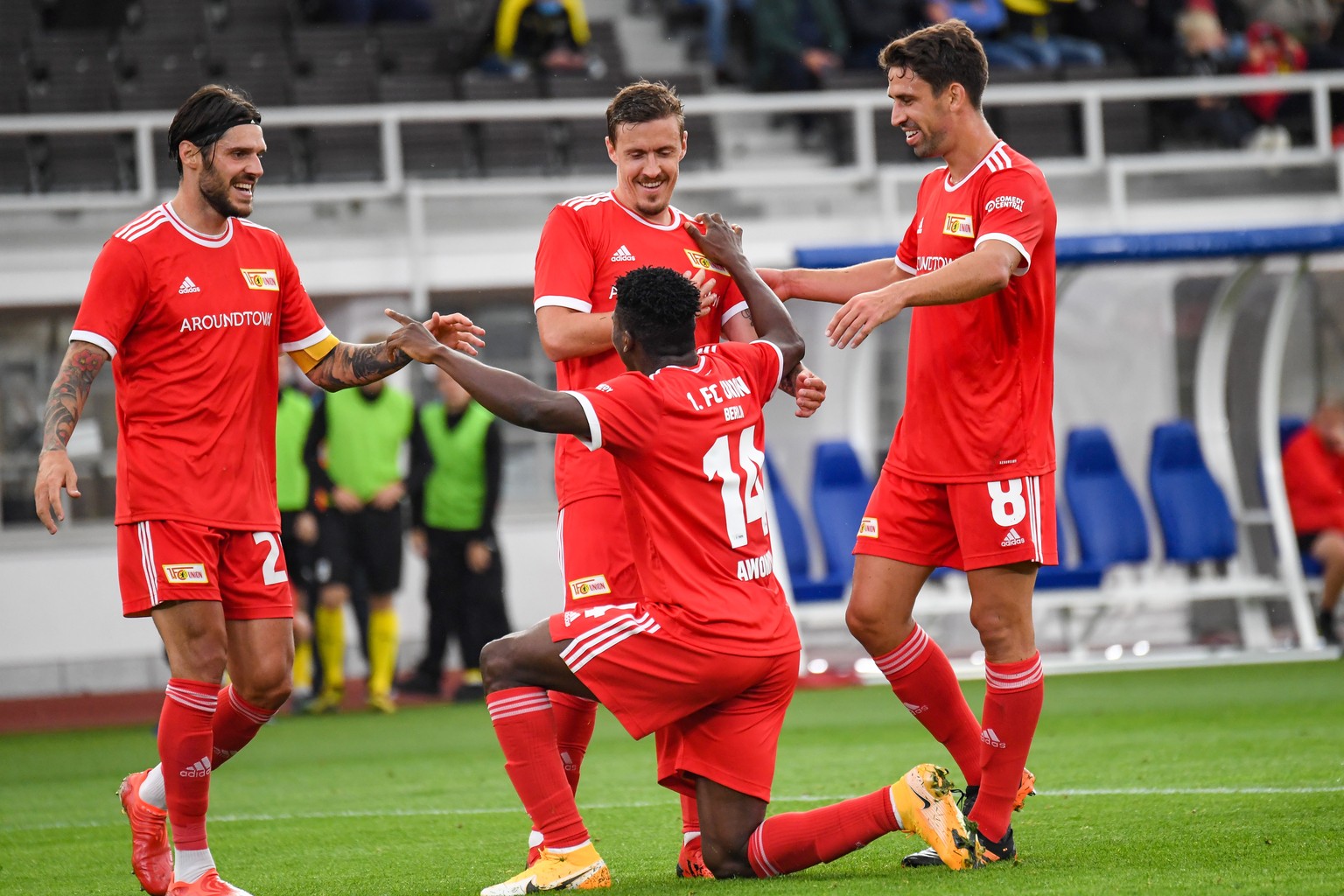 epa09420765 Taiwo Awoniyi of Union Berlin (C) reacts with teammates after scoring during the UEFA Europa Conference League Play-off, first leg soccer match between KuPS and Union Berlin in Helsinki, F ...