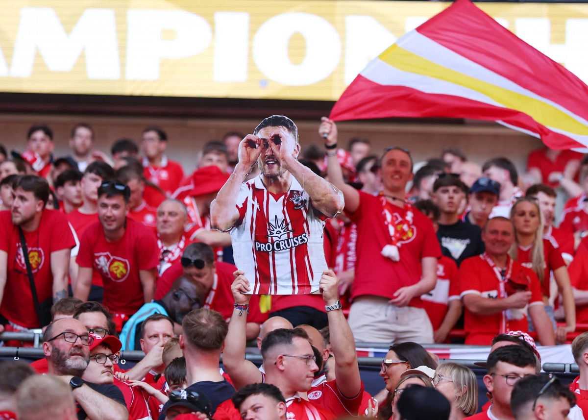 23rd May 2026 Wembley Stadium, London, England Championship Playoff Final Football, Hull City versus Middlesbrough Middlesbrough fans hold up a cardboard cutout of Taylor Harwood-Bellis of Southampton ...