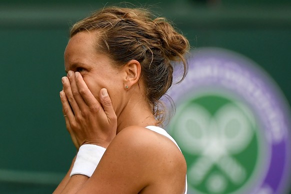 epa07705931 Barbora Strycova of the Czech Republic celebrates winning against Johanna Konta of Britain during their quarter final match for the Wimbledon Championships at the All England Lawn Tennis C ...