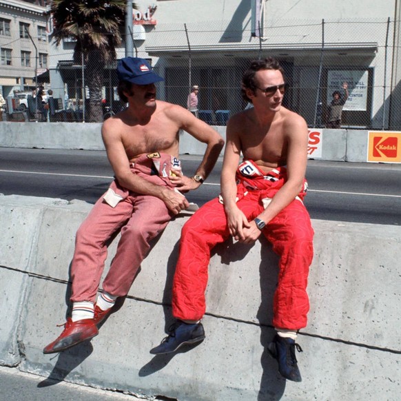 IMAGO / Motorsport Images

1976 United States GP WATKINS GLEN INTERNATIONAL, UNITED STATES OF AMERICA - MARCH 28: Clay Regazzoni and Niki Lauda sit on the pitwall during the United States GP at Watkin ...