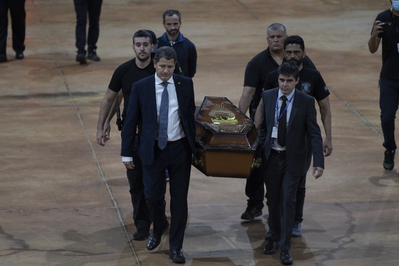 epa10017237 Authorities receive the bodies that were found in a remote region of the Amazon, where the British journalist Dom Phillips and the Brazilian indigenist Bruno Araujo disappeared, and whose  ...