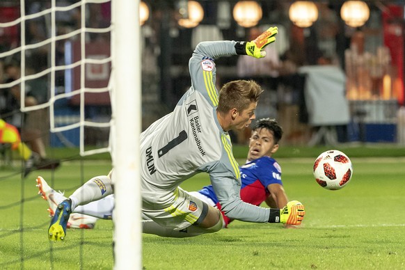 Basel&#039;s goalkeeper Jonas Omlin blocks a ball during the UEFA Champions League second qualifying round first leg match between Greece&#039;s PAOK FC and Switzerland&#039;s FC Basel 1893 in the Tou ...